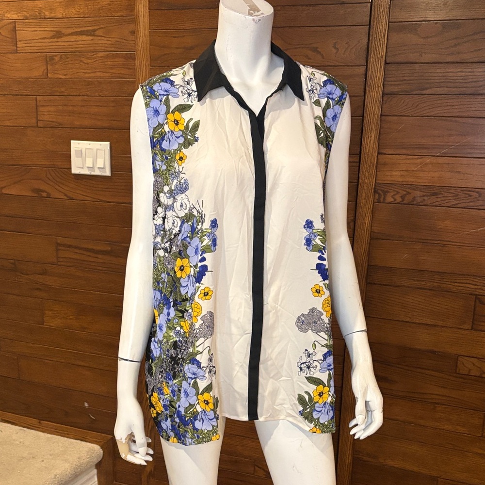 Ricki's White Floral Sleeveless Blouse with Black Trim